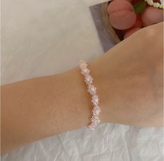 Flower Shaped Crystal Bracelet Gift, Elegant Flower Crystal Bracelet For Spring, Elegant Flower Shaped Crystal Bracelet For Spring, Adjustable Feminine Crystal Bracelet, Pink Feminine Beaded Bracelets, Elegant Adjustable Crystal Bracelet For Spring, Elegant Beaded Bracelets For Spring Gift, Casual Crystal Bangle Bracelet, Trendy Adjustable Crystal Bracelet