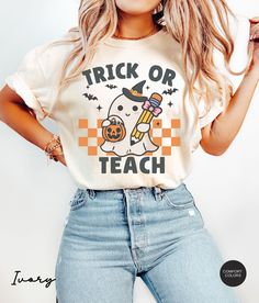 Embrace the spooky season with our Comfort Colors® Teacher Halloween Shirt! This retro ghost teacher shirt is the perfect Trick or Teach shirt, making it an ideal spooky teacher t-shirt for Halloween. Comfort Colors® Teacher Halloween Shirt, Halloween Teacher Shirt, Trick or Teach Shirt, Spooky Teacher T-shirt, Retro Ghost Teacher Shirt About Comfort Colors C1717 The Models in the pictures are wearing 1 or 2 sizes up, Please order 1 or 2 sizes up for an oversized look. Please refer to the size c Teacher Costumes Ideas, October Teacher Shirts, Halloween Shirts For Moms, Preschool Teacher Halloween Costumes, Sped Teacher Outfits, Fall Teacher Shirts, Halloween Costumes For Teachers, Halloween Teacher Shirts, Fun T Shirts