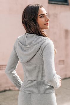 The Grey Cropped Front Zip Knit Hoodie gives off major relaxed vibes with its cropped cut and easy zip closure. It’s the perfect piece to throw on when you want to look effortlessly stylish while staying cozy. Product code: CAA06B4H005BB Features:  Knit Drawstring hood Long sleeve Front zipper Cropped Material: 52%ACRYLIC,28%NYLON,20%POLYESTER. Cropped Winter Sweater With Drawstring Hood, Sweater Zip Up, Stretch Cropped Sweater For Winter Streetwear, Stretch Cropped Sweater For Streetwear In Winter, Casual Hooded Cropped Sweater For Winter, Fitted Hoodie Sweater For Fall, Fitted Knit Hooded Hoodie, Fitted Fall Hoodie Sweater, Trendy Knit Hoodie For Spring