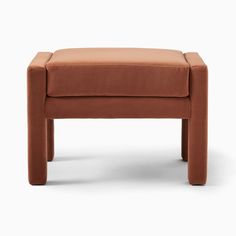 the foot stool is made out of brown fabric