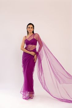 Featuring a burgundy pre-stitched saree in net base. It is paired with a strappy bandeau blouse. Color: BURGUNDY FABRIC: NET Delivery time 15 to 20 days Party Net Pre-draped Saree, Net Pre-draped Saree For Party Wear, Fitted Organza Pre-draped Saree For Evening, Party Wear Pre-draped Saree In Net With Traditional Drape, Party Wear Pre-draped Saree In Net, Party Net Pre-draped Saree In Traditional Drape, Party Net Pre-draped Saree With Traditional Drape, Fitted Organza Saree For Party Wear, Evening Fitted Organza Saree