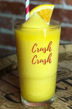 a yellow drink with a red and white striped straw