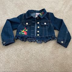 Like New Condition Denim Jacket With Embroidered Flowers Design Cute Long Sleeve Denim Blue Outerwear, Cute Denim Blue Spring Outerwear, Denim Blue Cute Spring Outerwear, Cute Medium Wash Denim Jacket For Spring, Cute Fitted Blue Denim Jacket, Cute Denim Blue Outerwear For Fall, Cute Denim Blue Fall Outerwear, Cute Medium Wash Outerwear For Spring, Flowers Design