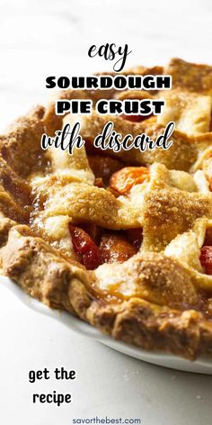 a close up of a pie on a plate with the words easy sourdough pie crust with dessert