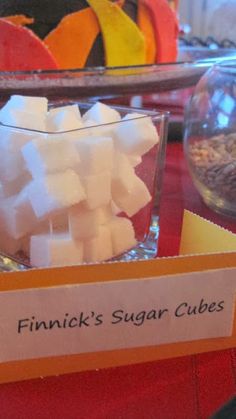 a table topped with lots of different types of sugar cubes