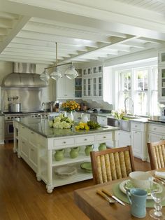 the kitchen is clean and ready to be used for dinner or other entertaining purposes in someone's home