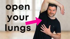 a man holding his arm up in the air with an open your lungs sign above him