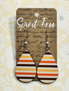 Snag these stunning earrings featuring a hand-pressed sublimation-style brown, yellow and orange striped design with stainless steel fishhook earring posts. Retro Brown Jewelry For Gift, Retro Teardrop Earrings As Gift, Orange Teardrop Earrings As Gift, Hypoallergenic Brown Drop Earrings, Fall Stripes, Fish Hook Earrings, Earring Posts, Stunning Earrings, Stripes Design