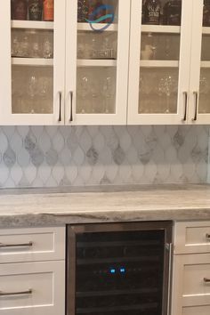 all white kitchen home bar idea with modern teardrop glass and marble tile Teardrop Tile, Bar In Kitchen, Kitchen Modern Farmhouse, Home Bar Ideas, Beach Decorations, Lantern Tile, Home Kitchen Bar, Cambria Quartz, Square Tiles