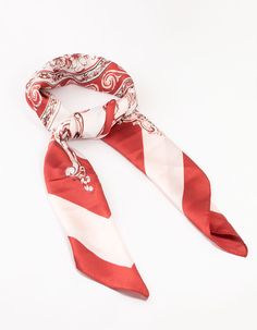 Scarves and bandanas are timeless trends. Add a printed scarf for a fun, playful finish. This red and white regal print elevates your look from drab to fab, ideal for parties, picnics, or festivals. Material: Fabric Color: Red, White & Gold Dimensions: Length 700 mm x Width 700 mm Weight: 0g | Lovisa Red & White Regal Print Fabric Scarf Fabric Scarf, Printed Scarf, Fabric Colour, Red Bandana, Bandana Scarf, Colour Red, Bandanas, Scarf Print, Print Fabric