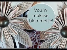 two paper flowers with the words you're makike blemmetie