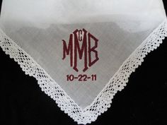 This hankie is a beautiful cotton with a crochet style lace edge.  The hankie measures 12" x 12" including the scalloped lace edge which is approximately 3/4" wide.  It is a pure white delicate cotton with an elegant translucent quality.  Notice the beautiful way the lace has been attached to the hankie - beautiful detail.It is perfect for any kind of personalization and offers enough space if you want a phrase embroidered.It will be embroidered to your specifications with a monogram or short ph Classic Handkerchiefs With Lace Trim As Gift, Cotton Handkerchiefs With Lace Trim For Wedding, White Monogram Handkerchiefs As Gift, Elegant Wedding Handkerchiefs With Embroidered Border, Embroidered Lace Handkerchiefs For Wedding, Elegant White Handkerchiefs With Initials, Monogrammed Handkerchiefs, Unique Monogram, Crochet Style