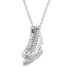 a necklace that has a shoe on it with some diamonds in the bottom and sides