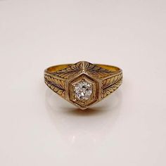 For Sale on 1stDibs - A very fine antique engraved 14k gold and diamond ring. With a lovely ca. 0.24 ct. Old European cut diamond (Color: G /Clarity: I1) set at the center of 14k Gold Engraved Ring With Rose Cut Diamonds, Ceremonial Yellow Gold Diamond Ring, Vintage Signet Ring With Diamond Accents, Yellow Gold Art Deco Diamond Ring With Brilliant Cut, Art Deco Yellow Gold Diamond Ring With Brilliant Cut, Victorian 14k Gold Diamond Cut Rings, 14k Gold Engraved Ring With Diamond Cut, Heirloom Gold Engraved Ring With Rose Cut Diamonds, Heirloom Brilliant Cut Diamond White Signet Ring