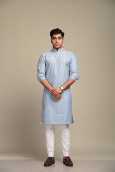 This is a bespoke product, specially crafted for you. Crafted in Chinese Collar and Full Sleeves Available with a Cotton Lycra Pajama in White, It has a self Embroidery design all over it which makes it best outfit for your Wedding Function, Diwali, Eid, Durga Pooja and Cocktail Parties. Do note: Footwear shown in the image are also made to order and can be added separately, but it takes 15 days processing time. (Slight variation in actual color vs. image is possible) Blue Cotton Kurta For Traditional Ceremonies, White Long Sleeve Handloom Traditional Wear, Cotton Traditional Wear With Long Sleeves For Ceremonies, Fitted Cotton Kurta For Puja, Long Sleeve Handloom Kurta For Navratri, Handloom Long Sleeve Kurta For Navratri, Cotton Long Sleeve Kurta With Pallu, Transitional Cotton Kurta With Self Design, Cotton Kurta With Traditional Patterns And Fit