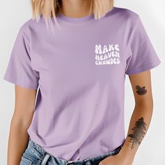 Looking for a meaningful and stylish gift? Our "Make Heaven Crowded" t-shirt, featuring a retro wavy font on the left breast, is the perfect choice. This crewneck is ideal for godmothers, moms, sisters, teen daughters, or friends who cherish their faith. Whether for church, Bible study, or casual wear, this Christian t-shirt makes a great addition to any wardrobe. Visit our Etsy store and make this faith-based gift yours today! Wavy Font, Make Heaven Crowded, Catholic Shirt, Bible Study Gifts, Christian Crewneck, Study Gift, Teen Daughters, Christian T Shirt, Christian Shirts