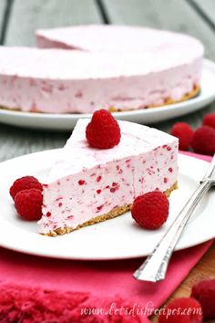 a piece of frozen raspberry cheesecake on a plate