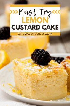 lemon custard cake on a white plate with blackberries