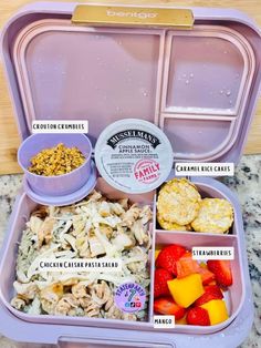 an open lunch box filled with different types of food