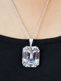 Gorgeous 100 carat solitaire pendant is one of a kind with excellent color, clarity and cut set in prong. The chain necklace looks fabulous and beautiful when worn. Perfect for an evening look. About the Product: Metal: Solid 925 Sterling Silver Stones: Cubic Zirconia Grade: AAAAA Cut: Excellent Clarity: Excellent Why Buy from Adastra? 1. The USA patented 925 Sterling Silver, making each creation last for decades. 2. Each of our products is skin-friendly and eco-friendly. It does NOT contain nic Diamond Pendent, Unique Pendant Necklace, Pendant Bails, Cz Pendant, Solitaire Pendant, High Jewelry, 925 Sterling Silver Jewelry, Emerald Cut, Solid 925 Sterling Silver