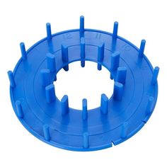 a blue plastic object with holes in the middle