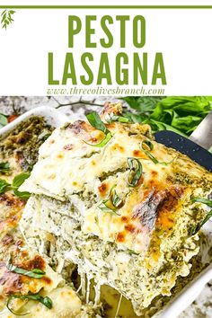 a casserole dish filled with pesto lasagna and topped with cheese