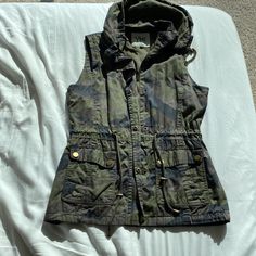 Never Worn- In Great Condition. Military Style Outdoor Vest For Fall, Military Style Vest For Outdoor Fall Activities, Outdoor Military Vest For Fall, Fall Outdoor Military Vest, Military Vest For Outdoor Activities In Fall, Military Vest For Fall Outdoor Activities, Casual Khaki Outerwear For Camping, Fall Camouflage Outerwear For Hiking, Casual Camping Outerwear With Pockets