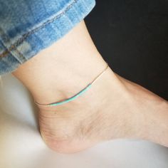 "Sterling liquid silver with turquoise heishi , handmade anklet comes with a barrel topped closure This anklet is flexible and lightweight, perfect to wear alone or for layering with more anklets. Size suggestions: Child: 7\" 7.5\" ( can be adult bracelet too) Teen: 8\" to 8.5 Adult: 9\" to 10\" hand-strung by me, message if you have any requests. Thank you and enjoy shopping!! Lovelyturquoise!!" Handmade Anklets, Liquid Silver, Heishi Beads, Anklet Jewelry, Matching Necklaces, Spring Rings, Delicate Bracelet, Handmade Silver, Body Jewelry