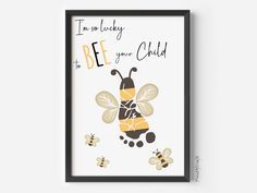 a framed poster with a bee saying i'm so lucky to be my mommy