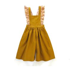 a child's yellow dress with ruffles on the shoulders and straps,