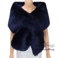 a mannequin wearing a blue fur stole