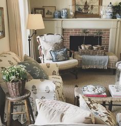 a living room filled with furniture and a fire place