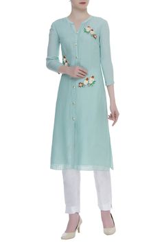 Invest in this pastel hue collection, pick this beautiful blue flower motif embroidered tunic.
Hand embroidery 
Button down placket
Notch neckline - Aza Fashions Traditional Light Blue Floral Embroidered Dress, Traditional Light Blue Dress With Floral Embroidery, Blue Straight Kurta Tunic For Spring, Summer Floral Embroidered Straight Kurta Top, Green Floral Embroidered Tunic For Spring, Sleeveless Floral Embroidery Kurta For Spring, Floral Embroidered Straight Kurta Top For Summer, Sleeveless Floral Embroidered Kurta For Spring, Green Floral Embroidery Tunic