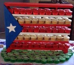 cupcakes are arranged in the shape of an american flag