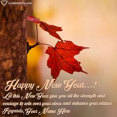 a happy new year card with a red leaf hanging from a tree trunk and the words, let this new year give you all the strength and courage to win