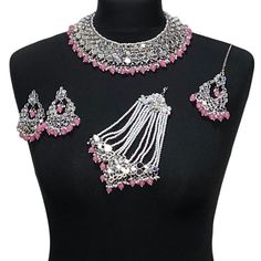 Handcrafted light pink silver mirror Indian sheesha wedding / bridal jewellery set. Set includes- Earrings  Collar necklace Jhumar Tikka  Our necklace is adjustable with a dori at the back giving you a comfortable fit. It comes with simple elegant mirror earrings with pearl detail, tikka and jhumar with hooks.  The glimmer of the mirrors with elegant pearl detail make this jewelry set a truly head turning piece, a must have for every jewellery box.  Our ethnic jewellery set harmoniously blends t Jhumar Tikka, Pakistan Jewelry, Jewelry Indian Wedding, Engagement Jewellery, Mirror Earrings, Pakistani Jewellery, Elegant Mirror, Jewelry Mirror, Indian Jewelry Sets