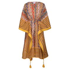 Our Nizhoni midi dress, which means ‘beautiful’ in Navajo, is designed to bring beauty and charm to your day. The wide colorful border complements the traditional native zigzag pattern that is popular in American Indian design. With vertical lines and bold joyful colors, this kaftan lengthens and slims. Tassels are hand made and hand beaded. 100% cotton, delicate cold machine wash in a lingerie bag to protect tassels or hand wash cold, hang dry. Length is 39" One size with adjustable drawstring Joyful Colors, Conservative Outfits, Zigzag Pattern, Indian Block Print, Vertical Lines, Zig Zag Pattern, Kaftan Dress, American Indian, Indian Design