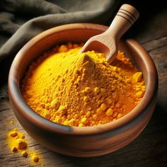 a wooden bowl filled with yellow powder