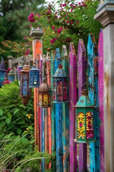 many colorful lights are hanging on the fence