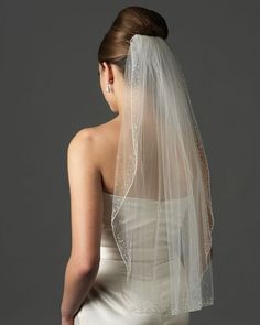 the back of a bride's wedding veil