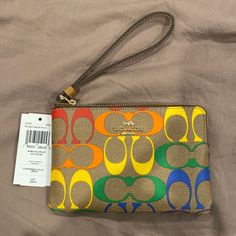 Questions? Leave A Comment Below! Coach Multicolor Pouch Wristlet, Coach Multicolor Travel Wristlet, Coach Multicolor Wristlet For Travel, Coach Multicolor Wristlet, Multicolor Coach Wristlet For Travel, Multicolor Coach Wristlet For Daily Use, Coach Multicolor Wristlet For Everyday, Multicolor Rectangular Wristlet With Zipper Closure, Multicolor Rectangular Wristlet With Zipper