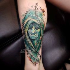 a person with a tattoo on their leg