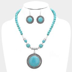 "Beautiful Burnished Silver Turquoise Beaded Round Pendant Necklace and Earring Set. Silver Metal Alloy. Lead & Nickel Compliant. Necklace Size: 20\" + 3\" L; Decor Size: 2.25\" L and Earring Size:1.75\" L. The Perfect Accessory to Add Just A Touch of Western Flair to Your Wardrobe." Turquoise Dangling Beads Costume Jewelry, Turquoise Costume Jewelry With Dangling Beads, Turquoise Beaded Dangle Jewelry, Bohemian Turquoise Jewelry Sets For Gifts, Adjustable Turquoise Bohemian Jewelry Sets, Turquoise Beaded Dangle Necklaces, Turquoise Dangle Jewelry With Colorful Beads, Turquoise Gemstone Beads Jewelry, Bohemian Turquoise Beaded Necklaces