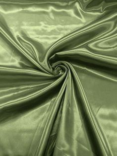 an image of a green satin fabric