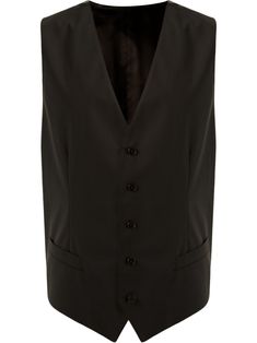 Domenico Dolce and Stefano Gabbana are the reigning kings of Italian glamour, as seen in this black wool blend button-down gilet. Featuring a v-neck, a sleeveless design, two front pockets and a buckle fastening at the rear. | Dolce & Gabbana Button-Down Gilet Classic V-neck Outerwear For Business, Sleeveless Business Outerwear With Button Closure, Elegant Black Wool Vest, Luxury Winter Vest For Workwear, Luxury Winter Workwear Vest, Classic Formal Winter Vest, Elegant Brown Business Vest, Formal V-neck Winter Vest, Formal V-neck Vest For Winter