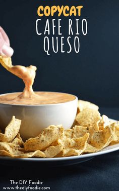 a person dipping tortilla chips into a white bowl filled with cafe rio queso