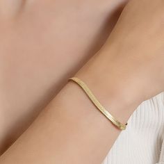 Add a trendy look to your jewelry collection by adding this Silver Reflections 14K gold over brass herringbone chain bracelet. This bracelet is crafted in 14K gold over brass, available in 6.5 inches length, has a solid herringbone chain construction and features a lobster clasp closure for a safe and comfortable wear. If you're looking for the perfect trendy chain bracelet for stacking or to wear alone, this bracelet is just what your jewelry collection needs! Wipe bracelet clean with a soft cl Herringbone, Chain Bracelet, Jewelry Collection, Brass, Chain, Silver, Gold