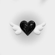 a black heart with two white wings on a gray and white background in the shape of an angel's wing