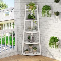 a corner shelf filled with potted plants next to a white brick wall in front of a house