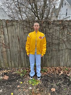 This is an awesome jacket that is ready to keep you warm in cold weather and looking great any other time. It is in good condition, but does have some marks on the sleeve and back, pictured. There are no rips, holes or smells.  Measurements:  Pit to pit: 26 1/2 inches  Collar to bottom front: 22 3/4 inches  Collar to bottom back: 26 1/2 inches  Sleeve Length (from collar): 34 1/2 inches  Size on tag: XL Casual Nylon Outerwear For College, Throwback Outdoor Outerwear For Fall, Throwback Long Sleeve Windbreaker For Fall, 90s Style Winter Windbreaker For College, Retro Long Sleeve Varsity Jacket For Outdoor, Retro Nylon Outerwear For Streetwear, Throwback Outerwear With Ribbed Cuffs, Retro Varsity Jacket For Outdoor, Retro Nylon Windbreaker For Fall